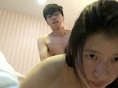 youthful asian Lovers make love at motel
