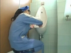 Asian toilet attendant cleans wrong part1