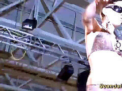 buxomy stripper spraying on public stage