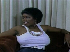 Ebony MILF in retro interracial gangbang video