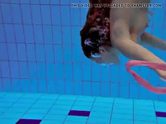 Katka Matrosova swims naked alone in the pool