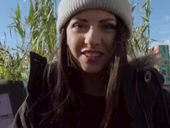 Amateur cutie is giving a nice blowjob on the street