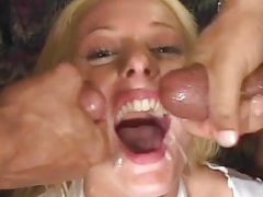 Blonde slut getting drilled by a pair of studs