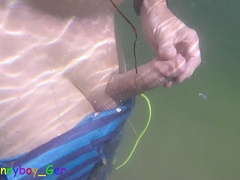 Extraordinary underwater getting off practice in a mountain lake while fishes observe. (S)