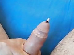 Jerking with pencil in peehole sounding