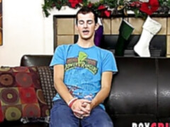 Twink strips after an interview and masturbates with a dildo