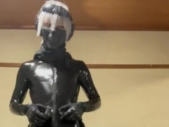 Condom fellow dressed in rubber gear