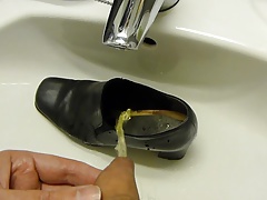 Piss in co-workers high heel