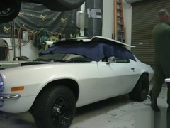 Ginger BDSM sub tugged by muscular hunk