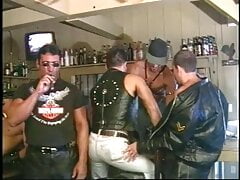 Sexy gay men have oral fun in bar
