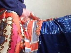 Wanking with two of my favourite satin skirts and cumshot