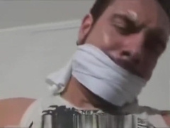 Mark Legnaro tied up and cleave gagged in tight jeans to a chair otm gagged