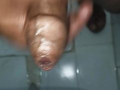 Indian middle age man massage his pennis with oil and gel