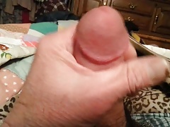 Stroking my cock a little.