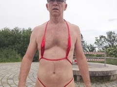 Submissive crossdresser Sklave-Franzd gets dominated in public with a huge anal toy