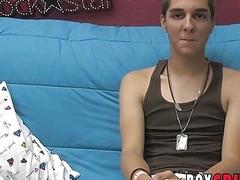 Adorable lad strips his clothes after interview and strokes
