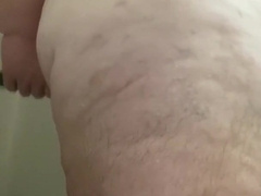 Panda toying with a cucumber