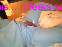 cockstuffing with catheter in full rubbersuit ( 2)