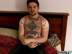 Husky naked man rubs his dripping meat