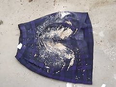 trample & crush soil on purple tartan skirt