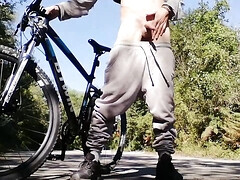 Young man playing with his bike with dildo in his ass