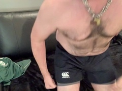 Unshaved muscle rugby pup jerks off in the coach's office