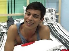 Cute twink is playing with his cock during an interview