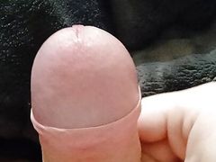 Young guy masturbates his big and fat dick