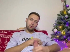 A young boy plays with his gigantic enormous fuck-stick and blows a load