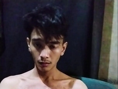 Young Japanese Attempts Romp on a Bench