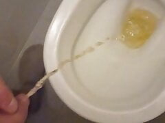 Pissing to toilet