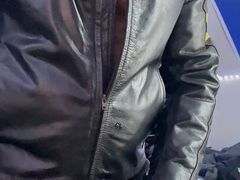 Bearded guy in leather jacket fucks his leather glove