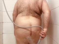 Hot guy enjoys steamy shower session