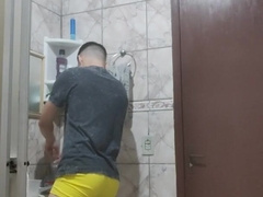 Taking a douche and recording bare