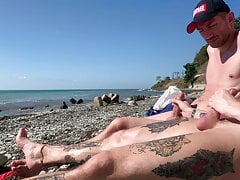 Jerk off and sucked a buddy on the beach
