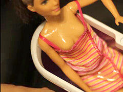 black-haired Barbie bukkake bathtub