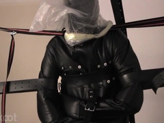 Standing Bondage In Leather Straitjacket