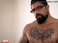 Ryan's knob is rock-hard as he stretches his pouch