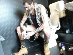 Grinding my hard cock in the men's room toilet