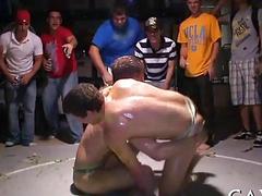 Humiliating hazing includes naked wrestling and getting pissed on
