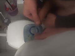 Two friends pissing together in one bottle and cockplay