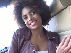 Curly-haired ebony Luna Corazon gives head and fucks in the car
