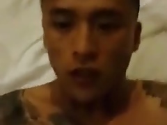Tattooed Chinese guy gets fucked