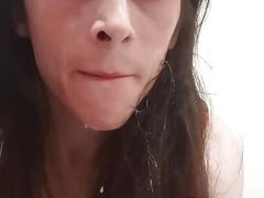 Sissy plays with her cum
