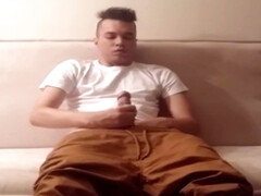 Playing with cock in living room