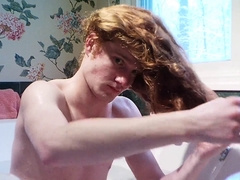 Redhead gay youngster enjoys a relaxing bath with a meatotomy twist