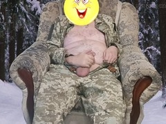 Ukrainian soldier relieves himself in the chilly winter forest with his big member