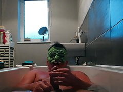 Bath wank with mask on