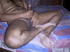 Pampering my thick uncut chocolate banana with both hands, featuring darkmeatboy