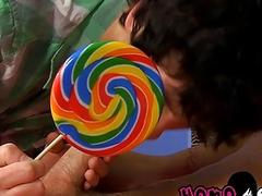 Young men lick candy while blowing each other and fucking